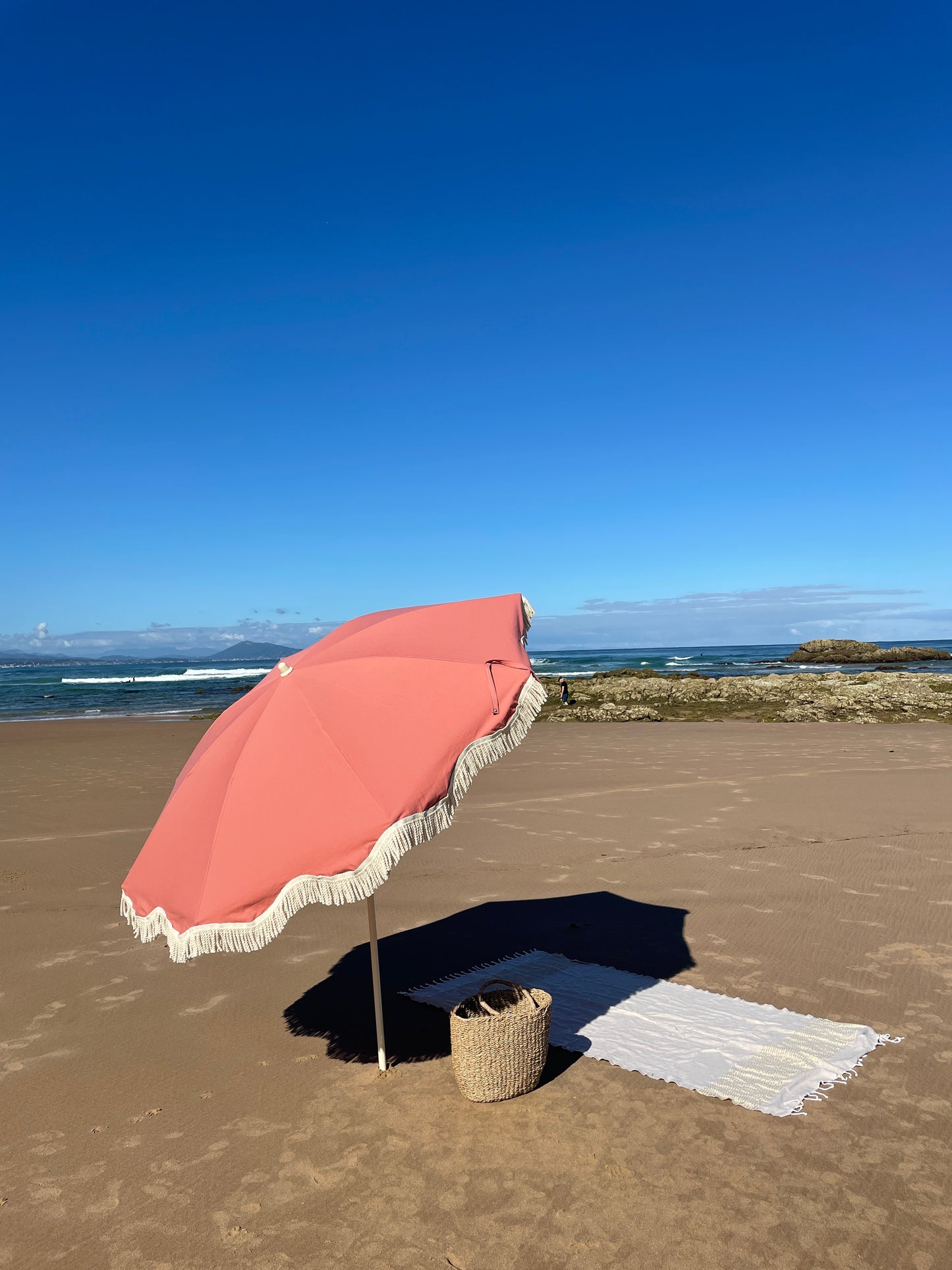 Parasol à franges uni rose